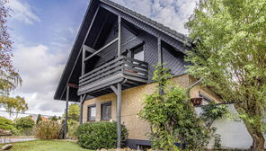 Langwedel-Völkersen: Großzügiges Zweifamilienhaus mit wohnlich ausgebautem Keller und Garten