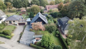 Langwedel-Völkersen: Großzügiges Zweifamilienhaus mit wohnlich ausgebautem Keller und Garten