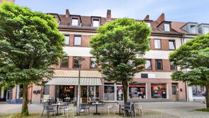 Kapitalanlage in Toplage – Mehrfamilienhaus mit 4 WE und 3 GE in der Vegesacker Fußgängerzone